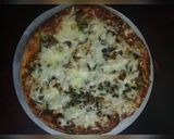 A picture of step 5 of Chicken pizza.