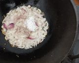 A picture of step 1 of Cheera Thoran (Spinach bhaji).