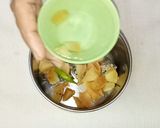 A picture of step 2 of Amla Murg Barley Khichadi with shots.