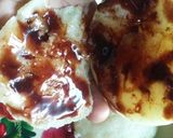 A picture of step 10 of Ice-Cream pomegranate sweet Idli Sandwich.