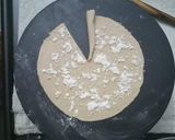 A picture of step 8 of Shankh/ conch shaped layered paratha.