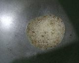 A picture of step 6 of Baingan bharta (smoked eggplant with spices).