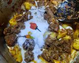 A picture of step 5 of Alu gosht.