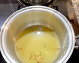 Foto del paso 2 de la receta: “ Arroz meloso” con anillas de pota