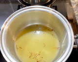 Foto del paso 2 de la receta: “ Arroz meloso” con anillas de pota