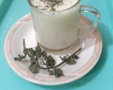 A picture of step 2 of Lassi with honey and mint.