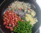 A picture of step 2 of Mix vegetable Red poha.