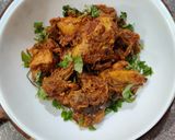 A picture of step 8 of Andhra chicken.