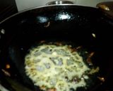 A picture of step 2 of Matar pulao.