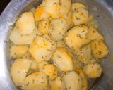 A picture of step 2 of Roasted potatoes and coated smokies.