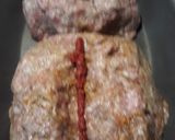 A picture of step 4 of Two Meatloaf in one pan.