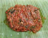 A picture of step 10 of Paneer wrapped in banana leaf.
