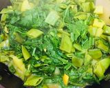 A picture of step 4 of Palak Sem Aaloo mix veg.