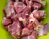 A picture of step 3 of Ragi mudda with mutton curry.