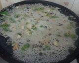 A picture of step 2 of Crispy rava dosai.
