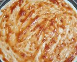 A picture of step 2 of Maxican pizza.