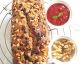 A picture of step 12 of Strawberry Banana Bread with Walnuts.