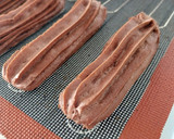 Foto del paso 14 de la receta: Eclairs de cacao relleno de trufa de chocolate
