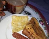 A picture of step 6 of Pancakes, Fried Egg, Sausage with a cup of tea.
