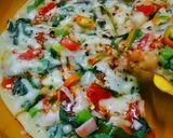 A picture of step 4 of Egg Pizza.