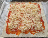 Foto del paso 5 de la receta: Pizza de hojaldre enrollada