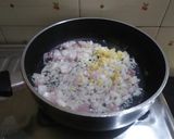 A picture of step 1 of Paneer bhurji (gravy form) with bun.