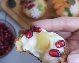 A picture of step 12 of Custard fruit puff tart.