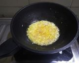 A picture of step 2 of Mexican beans enchiladas.