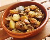 Foto del paso 6 de la receta: Pollo rustido con alcachofas y patatas