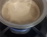 A picture of step 3 of Hot Cardamom Coffee.