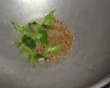 A picture of step 3 of Masaledaar Khattey aloo.