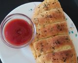 A picture of step 8 of Domino's style stuffed cheese garlic bread.