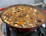 A picture of step 28 of Beef Bourguignon with Sweet Potato, Carrots, Turnips, and Mushrooms.