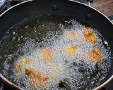 A picture of step 9 of Punjabi Kadhi Pakora with Rice.