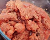 A picture of step 7 of Nasi Lemak (coconut milk rice, chicken gravy and fried chicken).