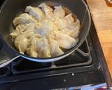 A picture of step 9 of Japanese pan fried dumplings with pork, napa cabbage and spring onion 🥟 - Gyoza.