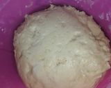A picture of step 4 of Vanilla cream filled doughnuts.