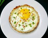 A picture of step 6 of Egg And Cheese Topped Hash Brown Nest.