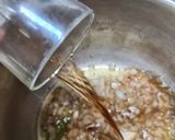 A picture of step 8 of Pork Meatballs with Tomato Sauce.