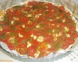 Foto del paso 10 de la receta Coca de masa brisa con tomate, pimiento y atún