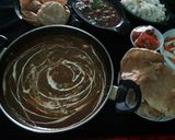 A picture of step 11 of Dal makhni.