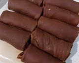 Foto langkah ke 6 dari resep Dadar Gulung Pisang Vla Coklat.
