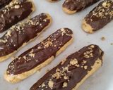 Foto del paso 8 de la receta Eclairs sin Gluten Rellenas de Crema Pastelera y Coulis de Fresas con Cobertura de Chocolate
