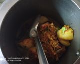 A picture of step 4 of Cabbage stuffed in potato and brinjal.