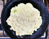 A picture of step 4 of Rava Roti / Suji Thalipeeth with Red Coconut Chutney.