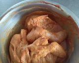 A picture of step 1 of Grill chicken tandoori styles.