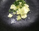 A picture of step 2 of Garlic bread with soup.