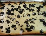 A picture of step 8 of Oreo layered cheesecake brownie.