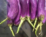A picture of step 1 of Brinjal French Fries.