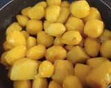 A picture of step 7 of Spicy Dum Aloo.